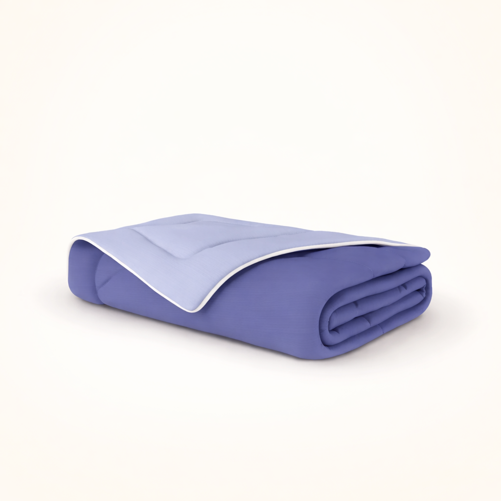 Heat Control Premium™ kølende dyne 140x200 cm på seng